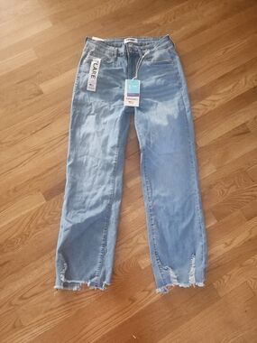 Women’s Light Wash Flare Jeans with Distressed Hem